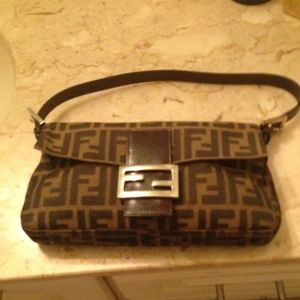 - Fendi baguette handbag genuine Authentic Bag.  Good Condition.